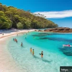 Home 21 호주 바다에서 상어주의 지역 - A serene Australian beach scene at midday along Queensland’s coast near the Great Barrier Reef, show...
